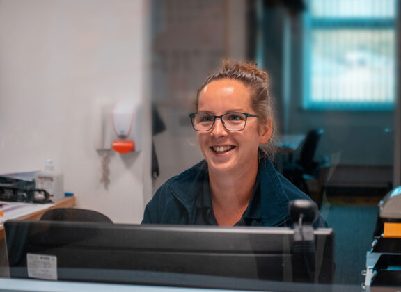 Lady on reception smiling